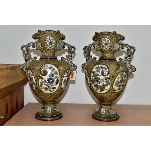 331 - A PAIR OF LATE NINETEENTH CENTURY AUSTRIAN MAJOLICA VASES BY GERBING & STEPHAN, the twin handled vas... 