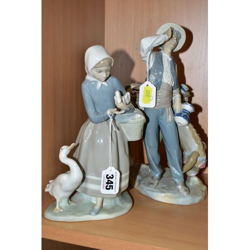 345 - TWO LLADRO FIGURINES, comprising Typical Peddler 4859, issued in 1974, retired in 1985, sculptor Sal... 