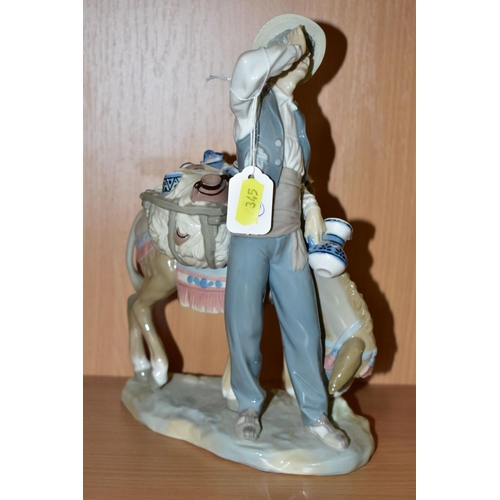 345 - TWO LLADRO FIGURINES, comprising Typical Peddler 4859, issued in 1974, retired in 1985, sculptor Sal... 