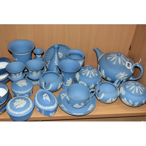 346 - A GROUP OF WEDGWOOD PALE BLUE JASPERWARES, eighteen pieces to include a teapot, two cream jugs, two ... 