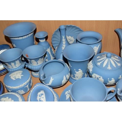 346 - A GROUP OF WEDGWOOD PALE BLUE JASPERWARES, eighteen pieces to include a teapot, two cream jugs, two ... 