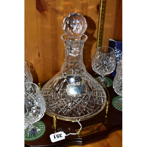 351 - A STUART CRYSTAL SHIPS DECANTER AND SIX BOXED BRANDY GLASSES, in Shaftesbury pattern, on a wooden pr... 