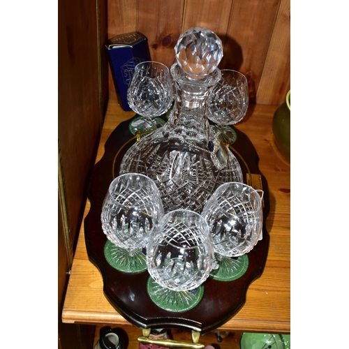 351 - A STUART CRYSTAL SHIPS DECANTER AND SIX BOXED BRANDY GLASSES, in Shaftesbury pattern, on a wooden pr... 