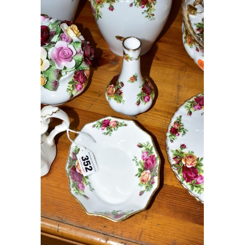 352 - A GROUP OF ROYAL ALBERT OLD COUNTRY ROSES GIFTWARES AND DINNERWARES, comprising a small novelty teap... 