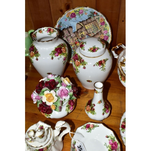 352 - A GROUP OF ROYAL ALBERT OLD COUNTRY ROSES GIFTWARES AND DINNERWARES, comprising a small novelty teap... 