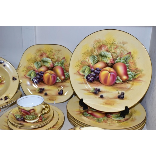 357 - A THIRTY TWO PIECE AYNSLEY 'ORCHARD GOLD' PART DINNER SERVICE, comprising a cake plate, two vegetabl... 