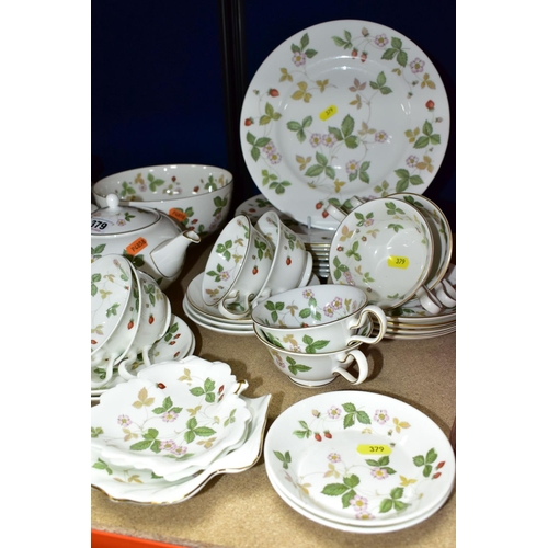 379 - A WEDGWOOD BONE CHINA 'WILD STRAWBERRY' R4406 PATTERN PART DINNER SERVICE AND A SMALL QUANTITY OF GI... 