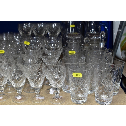 391 - A QUANTITY OF ASSORTED CUT GLASS DRINKING GLASSES, JUGS, GRAPEFRUIT DISHES, ETC, including pickle ja... 