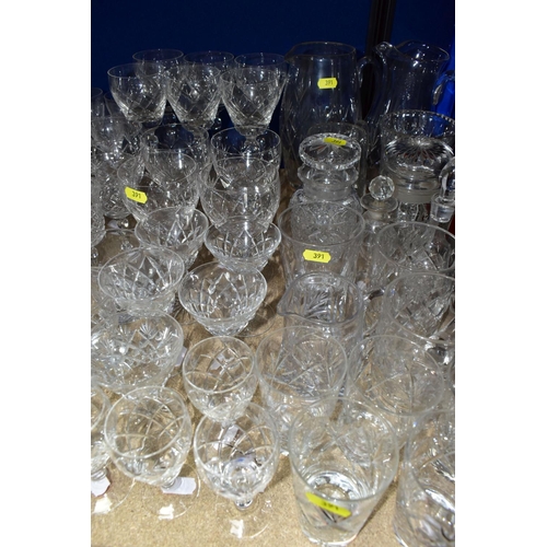 391 - A QUANTITY OF ASSORTED CUT GLASS DRINKING GLASSES, JUGS, GRAPEFRUIT DISHES, ETC, including pickle ja... 