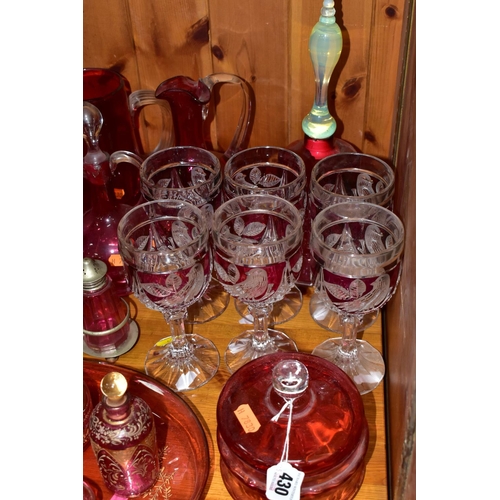 430 - A COLLECTION OF CRANBERRY GLASS AND OTHER GLASSWARES, to include cranberry glass vases, jugs, drinki... 