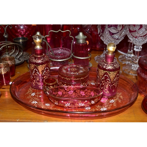 430 - A COLLECTION OF CRANBERRY GLASS AND OTHER GLASSWARES, to include cranberry glass vases, jugs, drinki... 