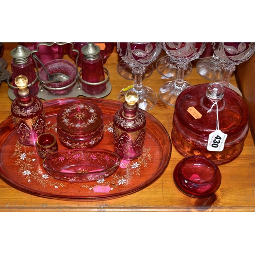 430 - A COLLECTION OF CRANBERRY GLASS AND OTHER GLASSWARES, to include cranberry glass vases, jugs, drinki... 