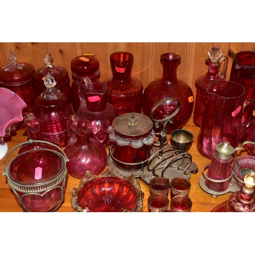 430 - A COLLECTION OF CRANBERRY GLASS AND OTHER GLASSWARES, to include cranberry glass vases, jugs, drinki... 