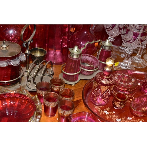 430 - A COLLECTION OF CRANBERRY GLASS AND OTHER GLASSWARES, to include cranberry glass vases, jugs, drinki... 