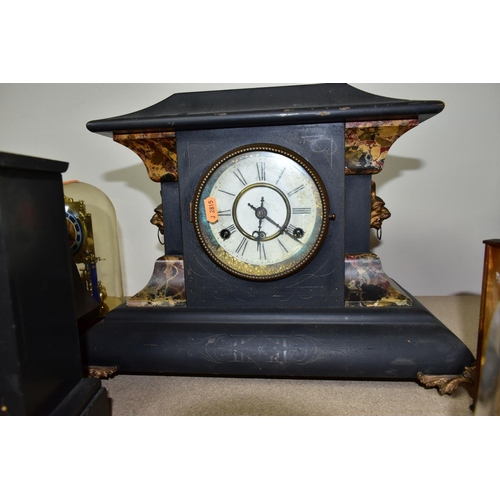 443 - A GROUP OF EIGHT MANTEL CLOCKS,  comprising a  Kieninger & Obergfell glass domed clock made in West ... 