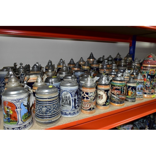 445 - A LARGE COLLECTION OF GERMAN BIER STEINS, comprising over seventy assorted steins made in Germany an... 