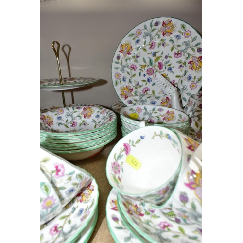 446 - A MINTON 'HADDON HALL' PATTERN TEA AND PART DINNER SET,  comprising six dinner plates (one has a gre... 