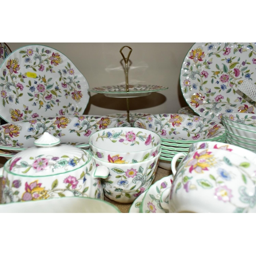 446 - A MINTON 'HADDON HALL' PATTERN TEA AND PART DINNER SET,  comprising six dinner plates (one has a gre... 