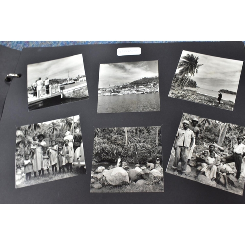 454 - PHOTOGRAPHS, a collection of one family's personal holiday photographs and postcards in six albums a... 