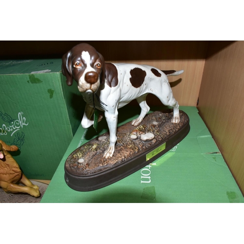 462 - THREE BOXED BESWICK DOG FIGURES, comprising The Pointer 3011/4a brown and white matt finish, issued ... 