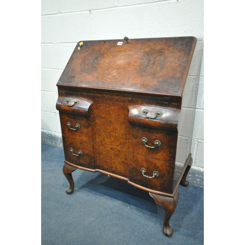 1486 - A WARING AND GILLOW LTD OF LONDON BURR WALNUT LADIES BUREAU, with a fitted interior, three exterior ... 