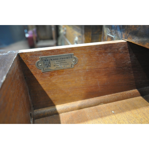 1486 - A WARING AND GILLOW LTD OF LONDON BURR WALNUT LADIES BUREAU, with a fitted interior, three exterior ... 