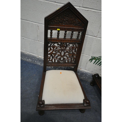 1493 - A PAIR OF HARDWOOD ORIENTAL CHAIRS, of very low proportions, with carved foliate detailing to back, ... 