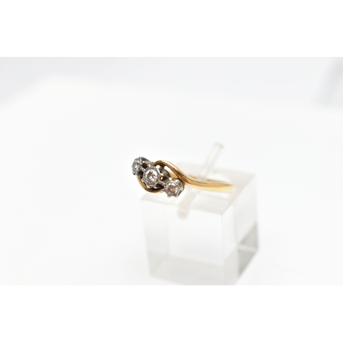 86 - A THREE STONE DIAMOND RING, three round brilliant cut diamonds set in an illusion white metal, appro... 