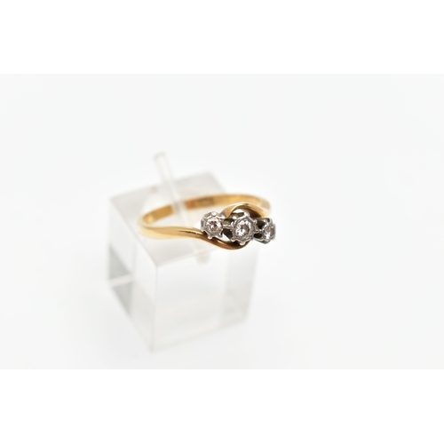 86 - A THREE STONE DIAMOND RING, three round brilliant cut diamonds set in an illusion white metal, appro... 