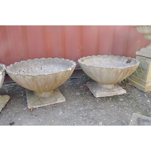 1006 - A PAIR OF COMPOSITE OYSTER SHELL GARDEN PLANTERS with shaped square bases, top is circular width and... 