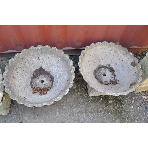 1006 - A PAIR OF COMPOSITE OYSTER SHELL GARDEN PLANTERS with shaped square bases, top is circular width and... 