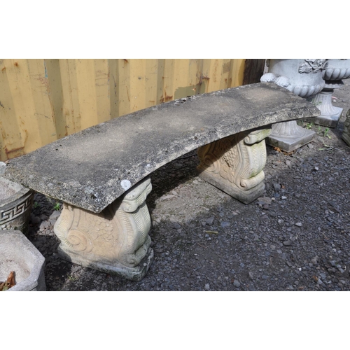 1010 - A MODERN COMPOSITE CURVED GARDEN BENCH with scrolled bases width130cm, seat depth 40cm height 45cm, ... 