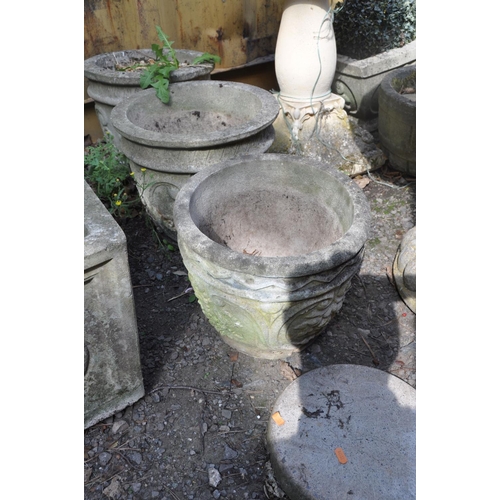 1015 - A PAIR OF COMPOSITE GARDEN PLANTERS , a similar planter and a plaque, the pair have foliate detail t... 