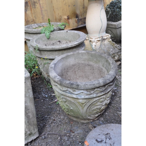 1015 - A PAIR OF COMPOSITE GARDEN PLANTERS , a similar planter and a plaque, the pair have foliate detail t... 