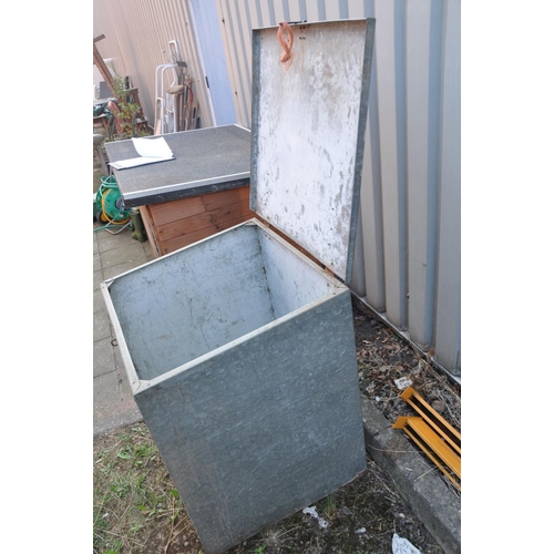 1020 - A GALVANISED STEEL ANIMAL FEED CONTAINER with a sloped hinged lid, width 75cm depth 70cm height at t... 