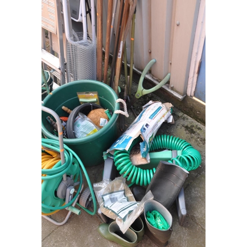 1022 - TWO SETS OF ALUMINIUM STEPS, a steel set of ladders, a hose reel, sack truck, step toolbox, and a qu... 