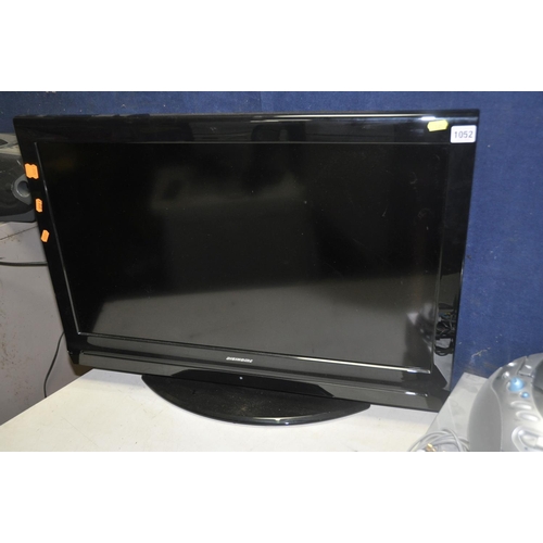 1052 - A DIGIHOME 32883DVD TV with no remote, along with a Jvc DR-MV5 DVD recorder and a Roberts CD9960 por... 