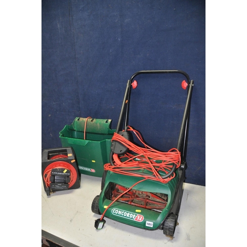 1057 - A QUALCAST CONCORDE32 LAWN MOWER with grass box along with a 30 metre garden extension reel (both PA... 