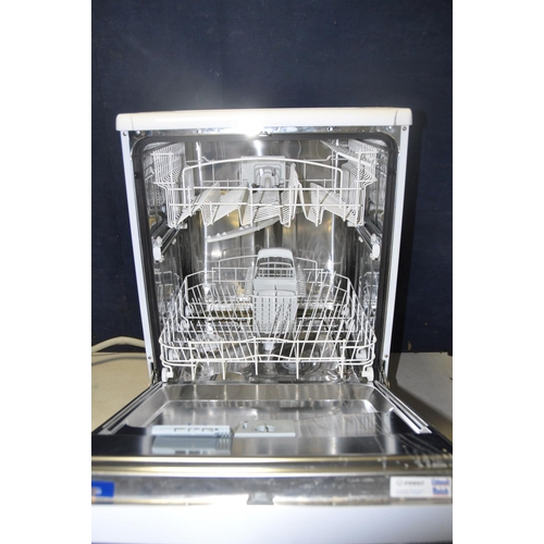 1059 - A INDESIT IDL530 DISHWASHER measuring width 60cm x depth 60cm x height 85cm (PAT pass and powers up)