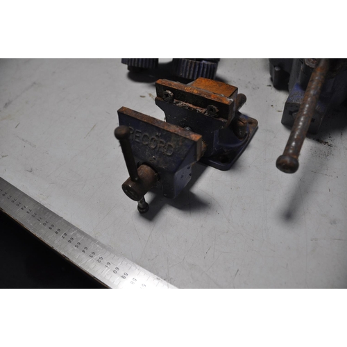 1073 - A MARPLES VICE along with three Marples floorboard clamps, and a small Record vice (all with some ru... 