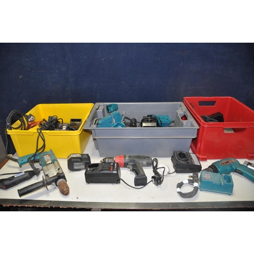 1075 - A LARGE QUANTITY OF DRILLS,BATTERYS AND CHARGERS to include brands such as Bosch, Makita, Dremmel an... 