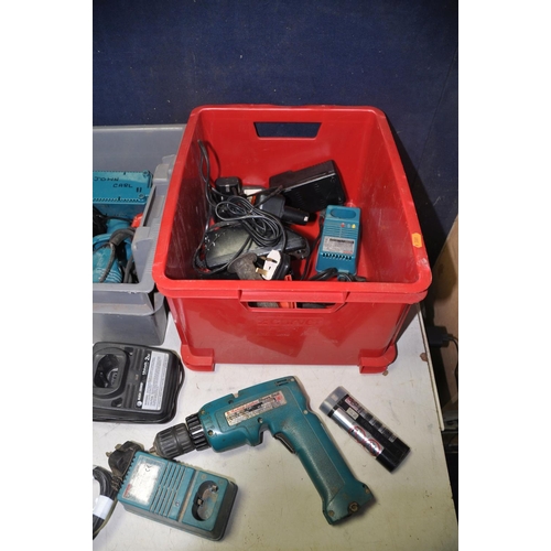 1075 - A LARGE QUANTITY OF DRILLS,BATTERYS AND CHARGERS to include brands such as Bosch, Makita, Dremmel an... 