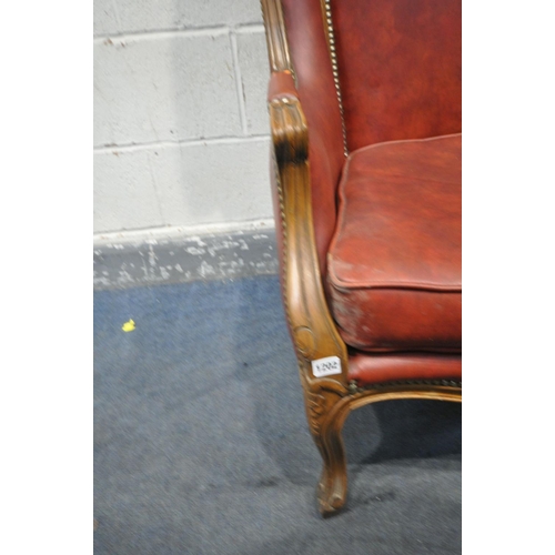 1202 - A 20TH CENTURY STAINED WOOD PORTERS CHAIR, with burgundy leather and studs that's bordering, width 7... 