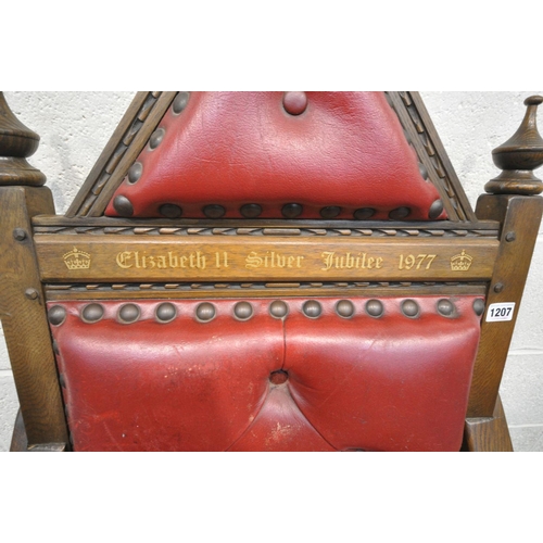 1207 - AN OAK THRONE CHAIR, with red leather upholstery, inscribed with gilt 'Elizabeth II Silver Jubilee 1... 