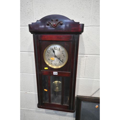 1216 - A MAHOGANY CASED VIENNA WALL CLOCK, winding key and pendulum, a 20th century, oak framed octagonal b... 