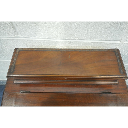 1219 - A 20TH CENTURY MAHOGANY DAVENPORT, with a raised back, red leather and gilt writing surface, on turn... 