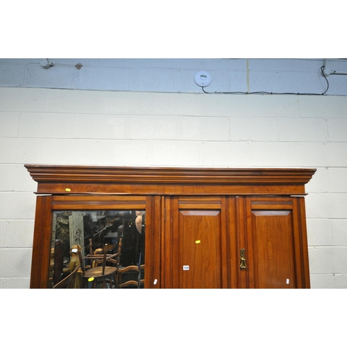 1228 - A LATE 19TH EARLY 20TH CENTURY MAPLE AND CO WALNUT COMPACTIUM WARDROBE, loose overhanging cornice, a... 