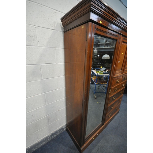 1228 - A LATE 19TH EARLY 20TH CENTURY MAPLE AND CO WALNUT COMPACTIUM WARDROBE, loose overhanging cornice, a... 