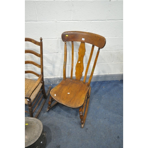 1231 - TWO 19TH CENTURY ROCKING CHAIRS, to include a rush seated ladder back rush seated armchair, and an e... 