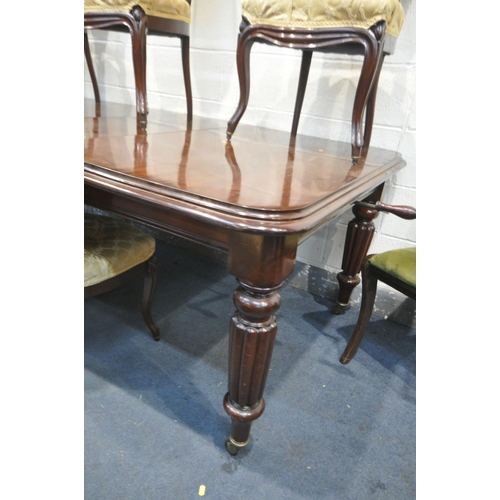 1234 - A VICTORIAN MAHOGANY WIND OUT DINING TABLE, with two additional leaves, on fluted legs, extended len... 